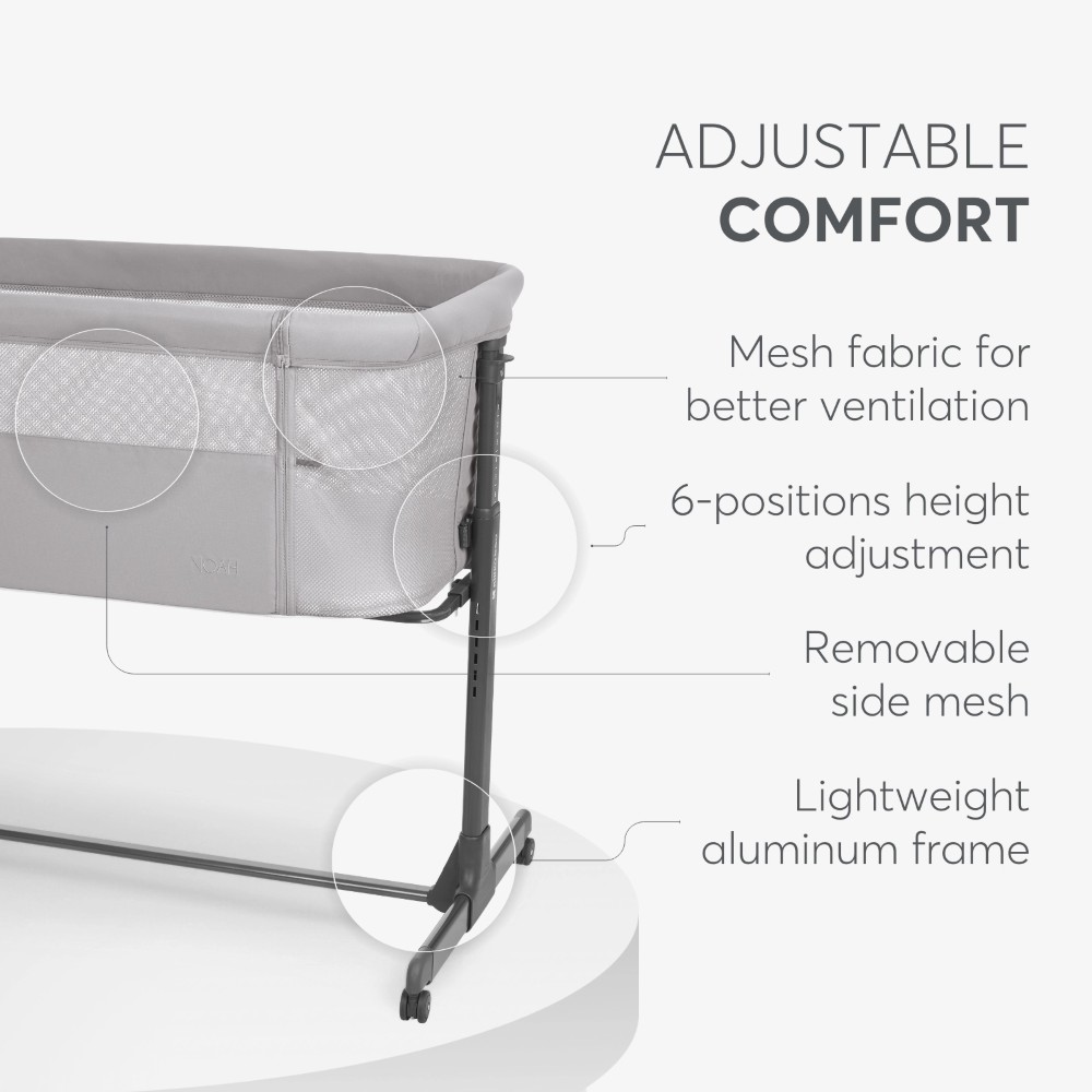 Η φωτογραφία δείχνει Το Bedside Crib NOAH είναι σχεδιασμένο για βρέφη από τη γέννηση έως 6 μηνών, παρέχοντας ένα ασφαλές, άνετο μέρος ακριβώς δίπλα στο κρεβάτι σας βοηθώντας τόσο τους γονείς όσο και το μωρό να επιτύχουν έναν ήσυχο και εύκολο νυχτερινό ύπνο.