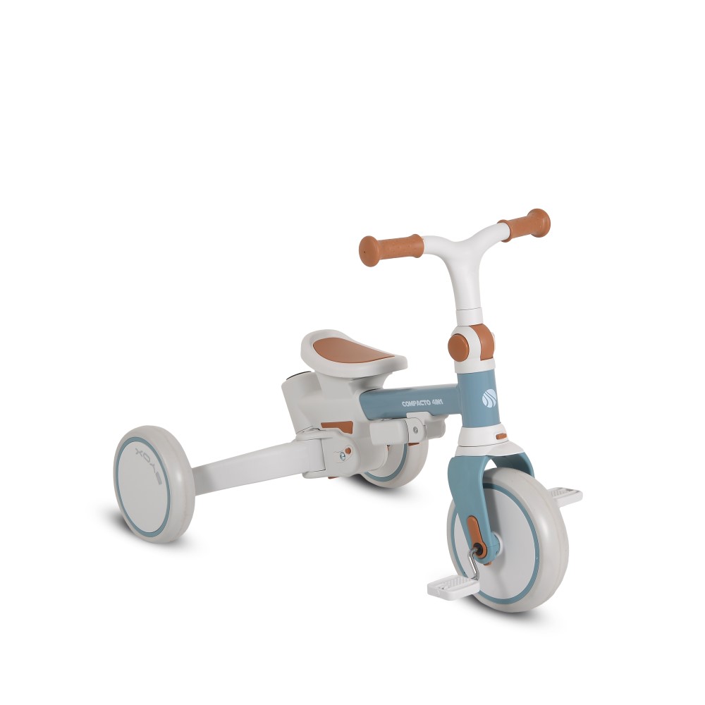 Η φωτογραφία δείχνει Compacto 4 σε 1, Byox – το τρίκυκλο που μεγαλώνει μαζί με το παιδί σας!Το πολυλειτουργικό τρίκυκλο Compacto 4 σε 1 έχει σχεδιαστεί για να προσαρμόζεται στις ανάγκες του παιδιού σας – από τις πρώτες κιόλας βόλτες μέχρι τις πρώτες ανεξάρτητες βόλτες του.