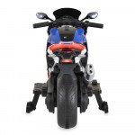 Η φωτογραφία δείχνει Moni, Παιδική Ηλεκτρική Μοτοσικλέτα Surfer για Παιδιά – Για Μικρούς που Αναζητούν την Περιπέτεια!Χαρίστε στο παιδί σας τον ενθουσιασμό της ελευθερίας και του ενθουσιασμού με την Surfer – μια κομψή, ισχυρή και απόλυτα ασφαλή ηλεκτρική μοτοσικλέτα, ειδικά σχεδιασμένη για παιδιά ηλ