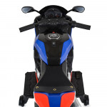 Η φωτογραφία δείχνει Moni, Παιδική Ηλεκτρική Μοτοσικλέτα Surfer για Παιδιά – Για Μικρούς που Αναζητούν την Περιπέτεια!Χαρίστε στο παιδί σας τον ενθουσιασμό της ελευθερίας και του ενθουσιασμού με την Surfer – μια κομψή, ισχυρή και απόλυτα ασφαλή ηλεκτρική μοτοσικλέτα, ειδικά σχεδιασμένη για παιδιά ηλ