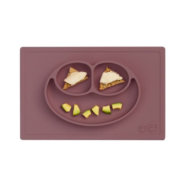 Το Happy Mat είναι το πρώτο και βραβευμένο σκεύος φαγητού της Ezpz!&nbsp;Η φατσούλα χωρίζει τα φαγητά σε τρία χωρίσματα, έτσι το φαγητό δεν ανακατεύεται και δεν ακουμπάει η μία τροφή την άλλη, έτσι&nbsp; νιώθουν περισσότερο ανεξάρτητοι και έτοιμοι να για νέες δοκιμές! Και η μανούλα μπορεί να βάλει σ