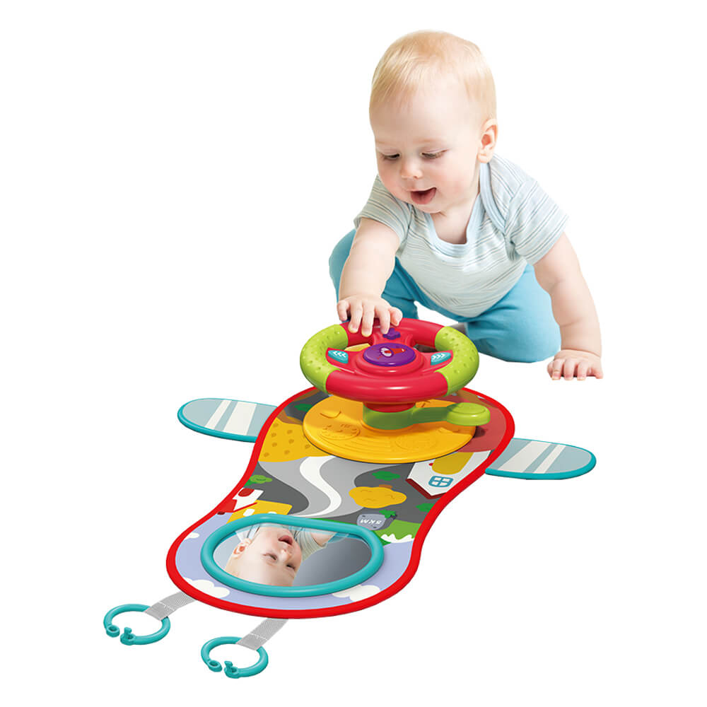 Η φωτογραφία δείχνει Το κρεμαστό παιχνίδι Trip 3 σε 1 είναι το ιδανικό παιχνίδι για να κρατήσει το παιδί σας χαρούμενο και απασχολημένο, ενώ κάνετε τη βόλτα σας είτε με το αυτοκίνητο, είτε με το καρότσι ή ακόμη και στο σπίτι!Στο παιχνίδι ρόλων που εμπλέκονται τα παιδιά&nbsp; μιμούνται τις δράσεις τω