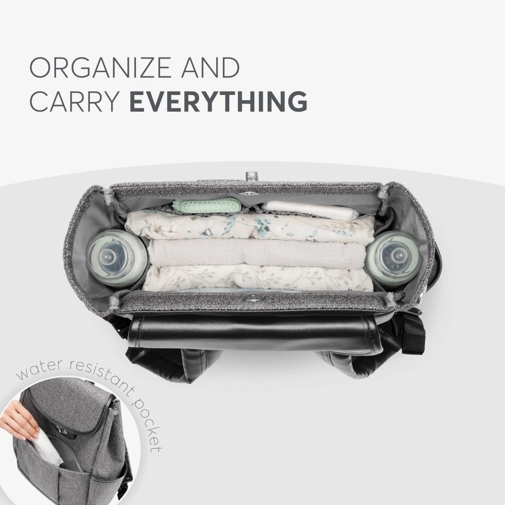 Η φωτογραφία δείχνει Ζήστε την κομψότητα και την πρακτικότητα με την τσάντα MORICE Mama! Σχεδιασμένη για σύγχρονους γονείς, αυτή η πολυτελής τσάντα συνδυάζει το εκλεπτυσμένο στυλ με την έξυπνη λειτουργικότητα, διασφαλίζοντας ότι όλα τα απαραίτητα για το μωρό είναι πάντα προσιτά.