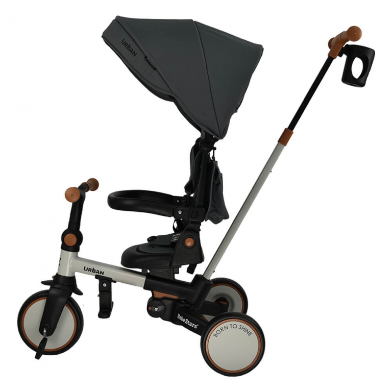 Η φωτογραφία δείχνει Ετοιμαστείτε μικροί και μεγάλοι για τις πιο συναρπαστικές βόλτες σε κάθε γωνιά της πόλης με το νέο τρίκυκλο Urban της Bebe Stars!Ένα πολυχρηστικό μοντέλο, καθώς χρησιμοποιείται με 7 διαφορετικούς τρόπους και συντροφεύει το παιδάκι σας για χρόνια σε κάθε του βήμα.
