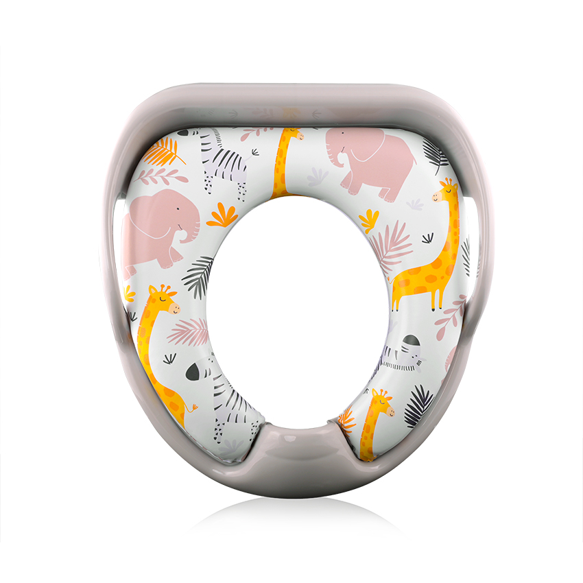 Η φωτογραφία δείχνει Μαλακό εκπαιδευτικό κάθισμα τουαλέτας με χειρολαβεςΤο μαξιλαράκι είναι αποσπώμενο για εύκολο καθάρισμαΔιαθέτει προστατευτικό πλαστικό για την πρόληψη της διαβροχήςΠρακτικές πλευρικές χειρολαβές