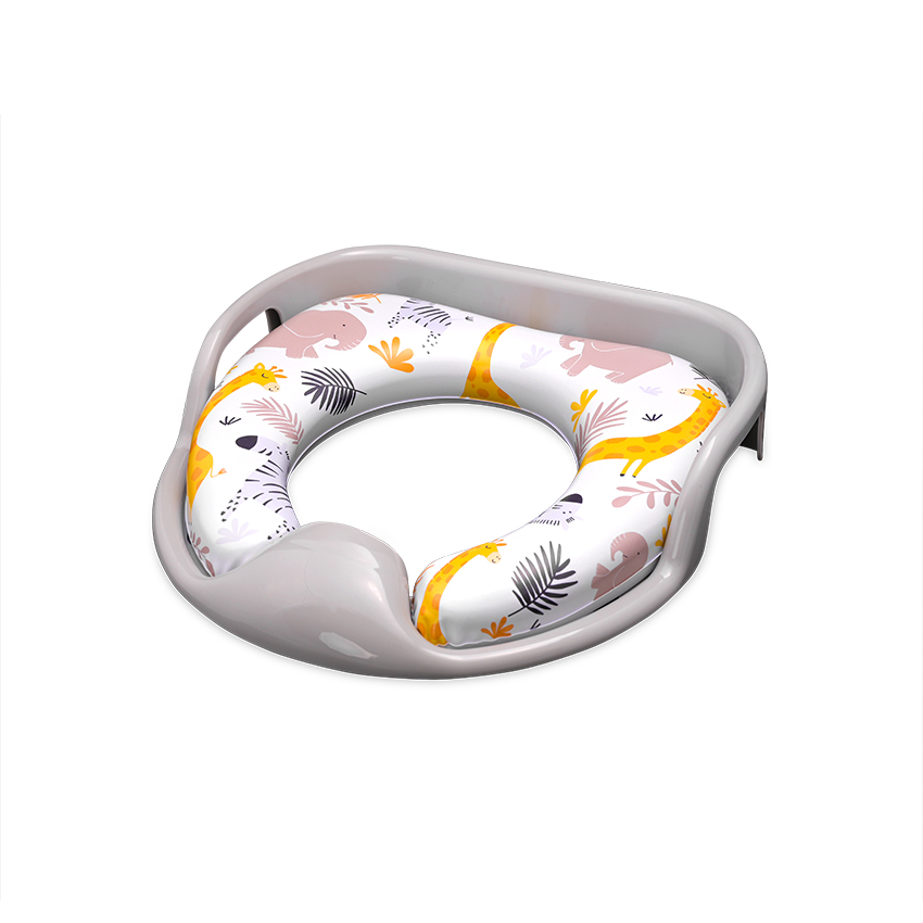 Η φωτογραφία δείχνει Μαλακό εκπαιδευτικό κάθισμα τουαλέτας με χειρολαβεςΤο μαξιλαράκι είναι αποσπώμενο για εύκολο καθάρισμαΔιαθέτει προστατευτικό πλαστικό για την πρόληψη της διαβροχήςΠρακτικές πλευρικές χειρολαβές